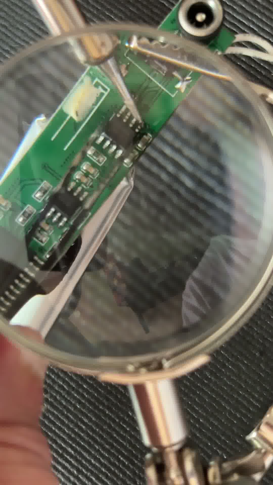 Soldering the new TC4056A in place